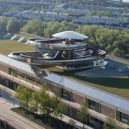 Архитектура и освещение Fenix Museum Rotterdam - нового Роттердамского Музея, отражающего историю миграции людей из Европы в Америку в конце XIX- начале ХХ века.